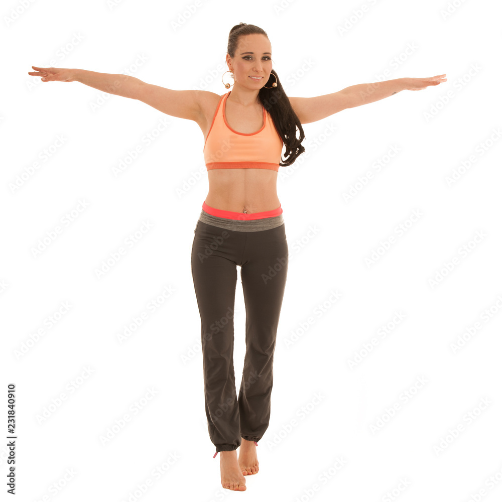 Young woman practice yoga standing isolated over white background Young woman practice yoga standing isolated over white background