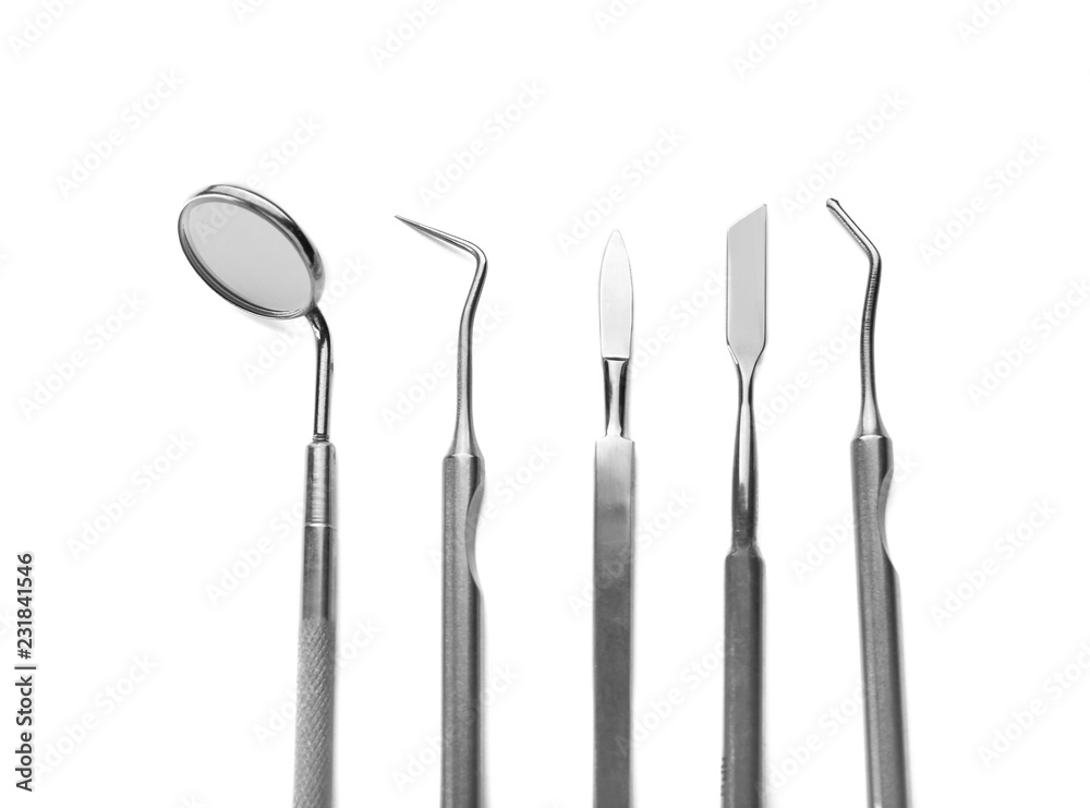 Dentist's tools on white background Dentist's tools on white background