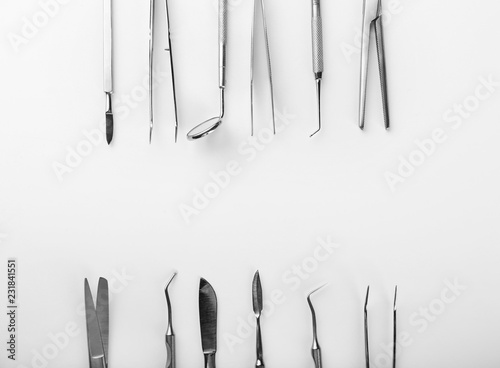 Dentist's tools on white ba...
