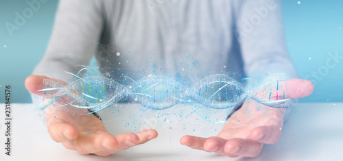 Принти на полотні Businessman holding a 3d render DNA