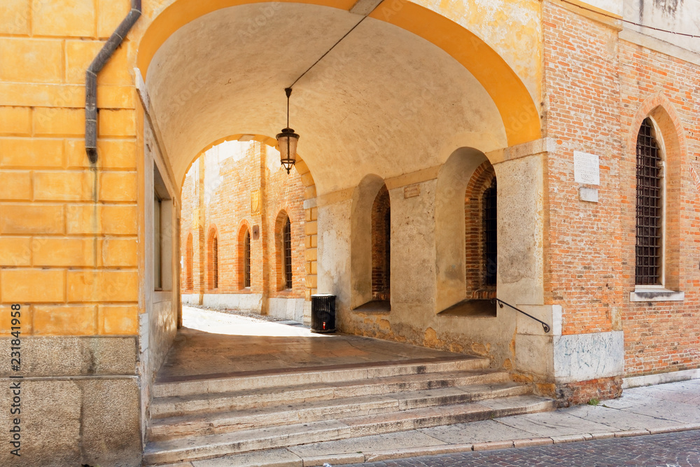 Naklejka premium Treviso, Italy August 7, 2018: arched structures in the old buildings of the city.