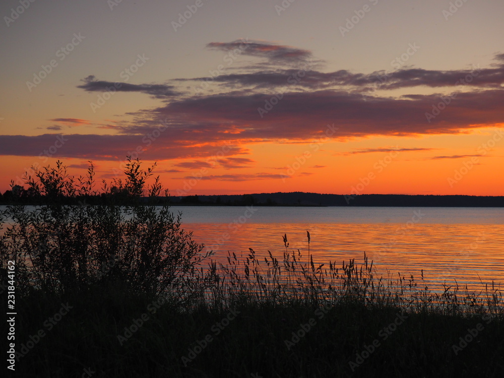 Sunset. On the big river. Summer. Russia, Ural, Perm region
