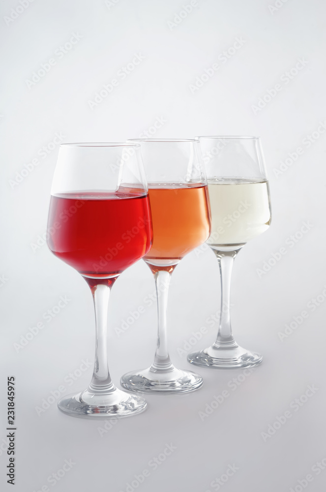 Glasses of tasty wine on white background Glasses of tasty wine on white background