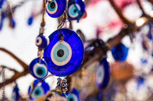 Blue eyes from the evil eye, a national symbol and guardian in Turkey. Many round blue eyes hang on a tree, which is protection from the bad.