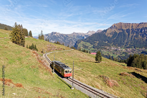 Panoramatic view of Jungfrau Region with incoming train from Gruetschalp (Grütschalp) near Winteregg, Jungfrau Region, Switzerland