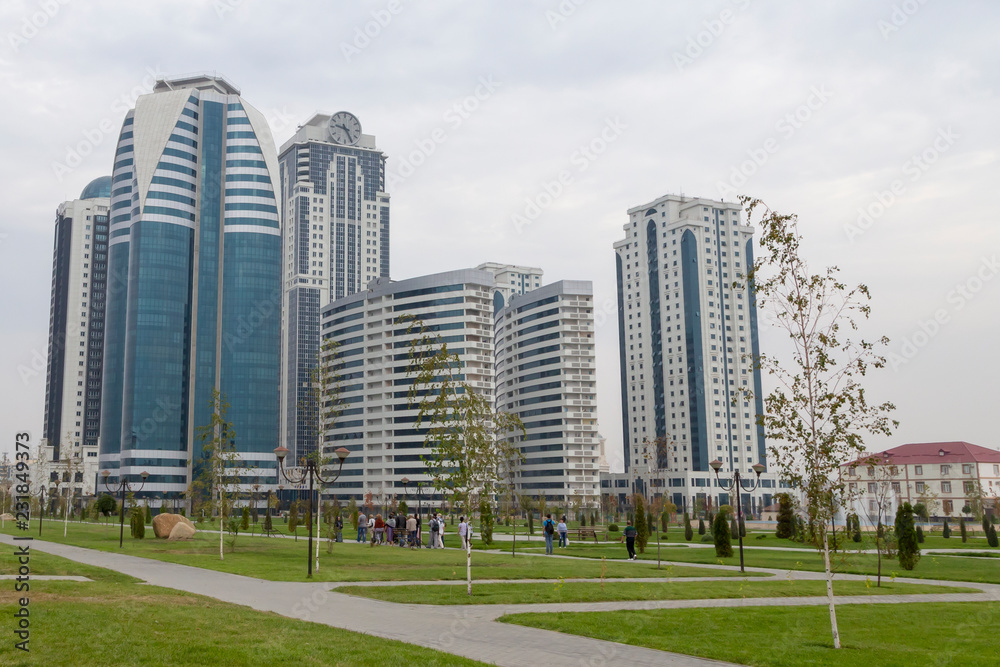 Grozny, Russia: 10.07.2015. Daily life in Chechen Republic. View of the park and skyscrapers complex Grozny City