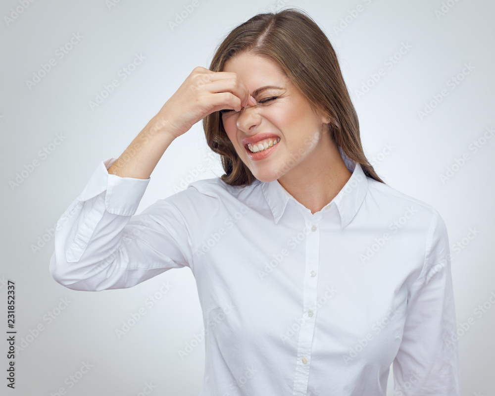 Woman with headache pain touch head with hands Woman with headache pain touch head with hands