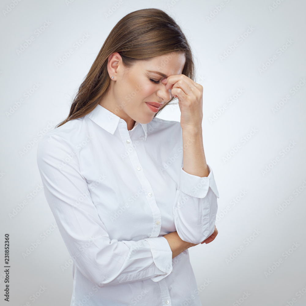 Woman with headache pain touch head with hands Woman with headache pain touch head with hands