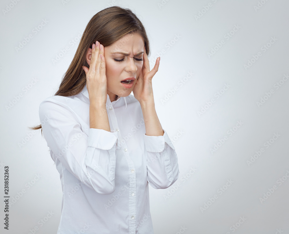 Woman with headache pain touch head with hands Woman with headache pain touch head with hands