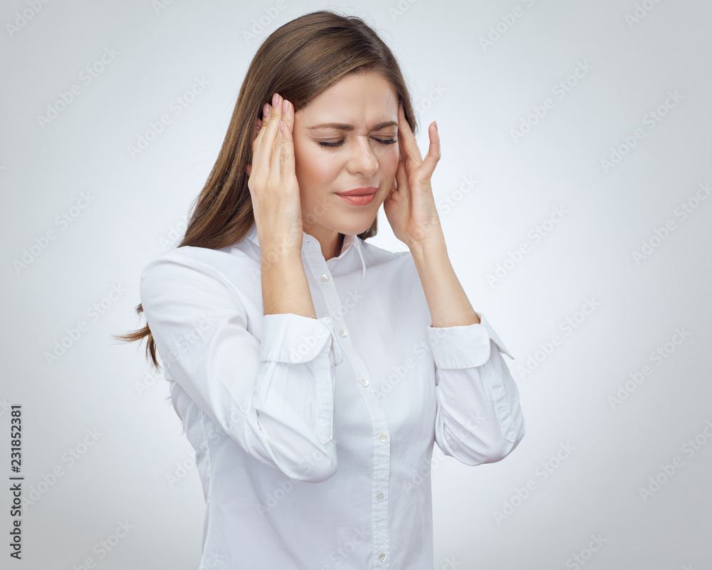 Woman with headache pain touch head with hands Woman with headache pain touch head with hands