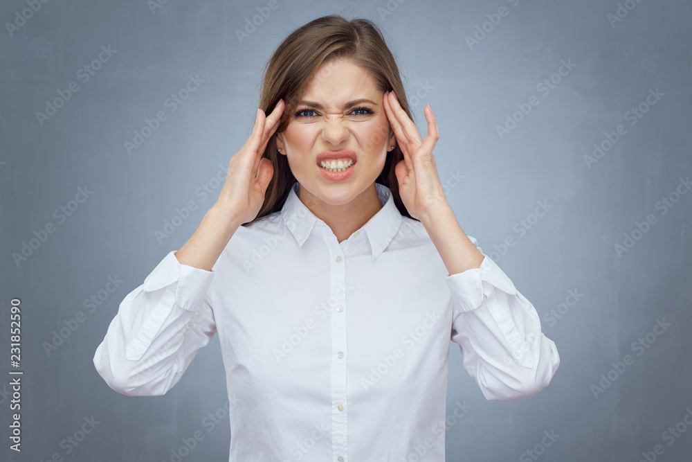 Portrait of woman with headache migraine pain Portrait of woman with headache migraine pain