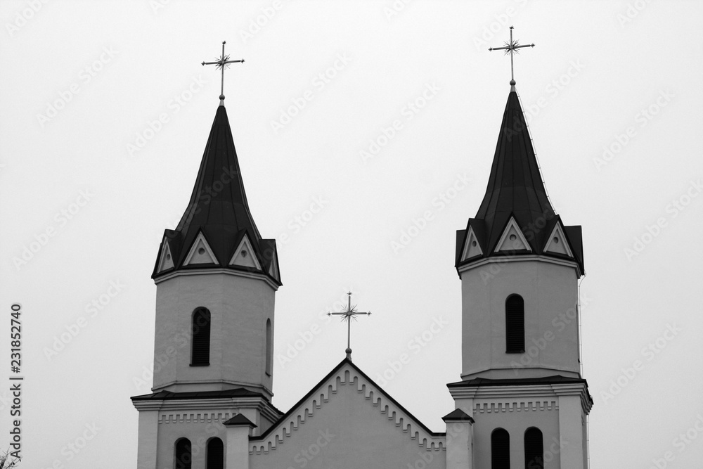 Old catholic church in Belarus in black and white.