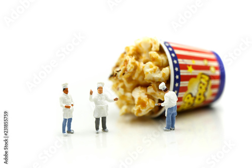 Miniature people : Chef and friend with popcorn.