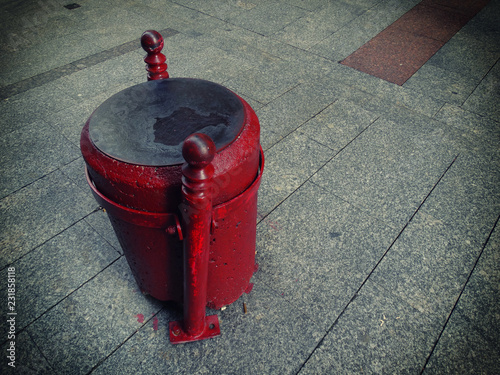 Old milestone red stone over street floor - Boundary marker