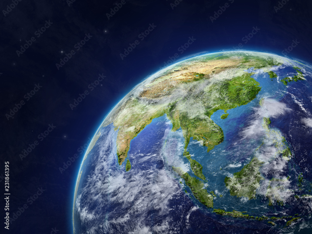 Asia on model of planet Earth with very detailed planet surface and clouds.