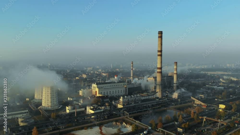 Smoke from pipes in the city, pollution of the atmosphere and environment, air view Smoke from pipes in the city, pollution of the atmosphere and environment, air view