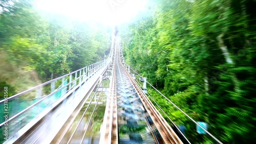 wide shot of sapporro city from a cable car going up mountain moiwa, hokkaido, japan photo