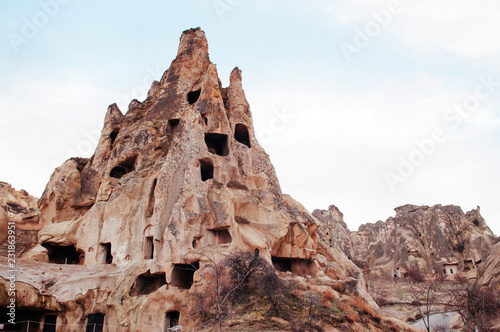 Nunnery inside volcanic rock landscape at Goreme - Cappadocia, Turkey