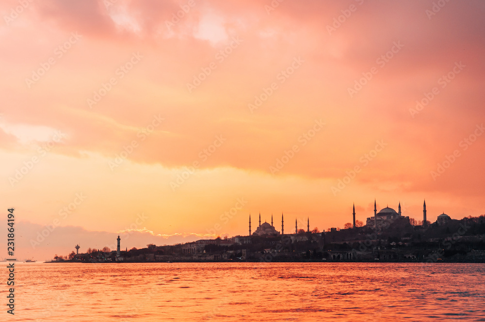 Dramatic Sunset over Blue Mosque and Hagia Sophia, Istanbul - Turkey