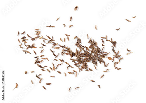Pile of cumin, caraway seeds isolated on white background, top view photo