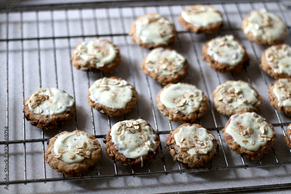 Pile of oatmeal, cranberry and white chocolate cookies. Selective focus.
