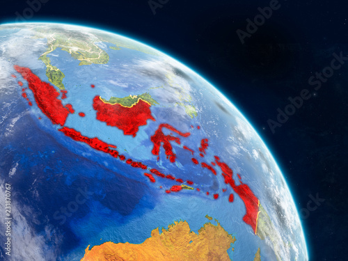 Indonesia from space on realistic model of planet Earth with country borders and detailed planet surface and clouds.