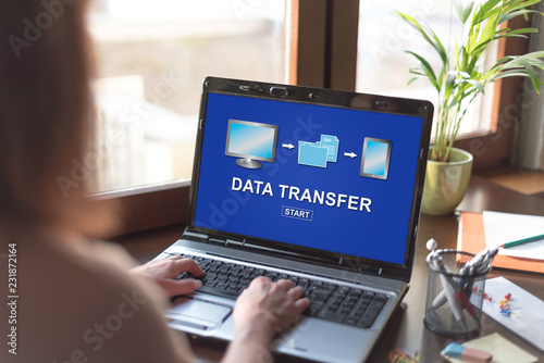 Data transfer concept on a laptop screen