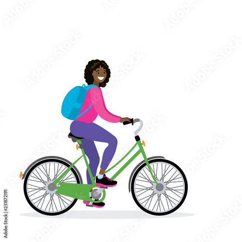 Happy african american female bicyclist with backpack
