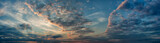 Panorama evening sky with blue, white and orange clouds