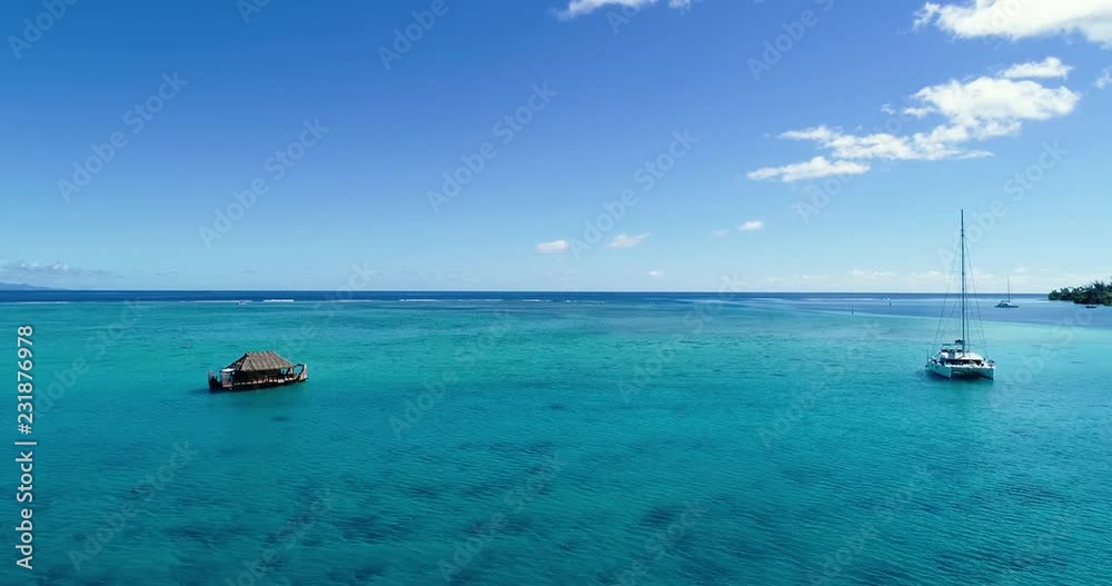 boat bungalow (house) on a lagoon in aerial view, French Polynesia boat bungalow (house) on a lagoon in aerial view, French Polynesia
