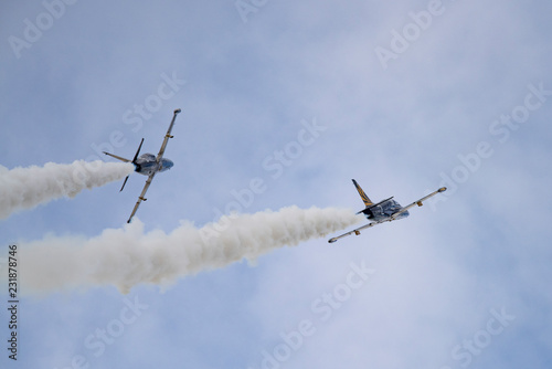 Aerobatic team Russ on aircraft L-39 Albatross performs the program at the air show photo