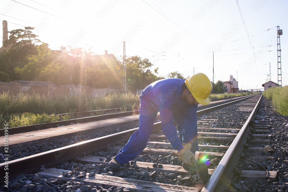 worker working on railroad
