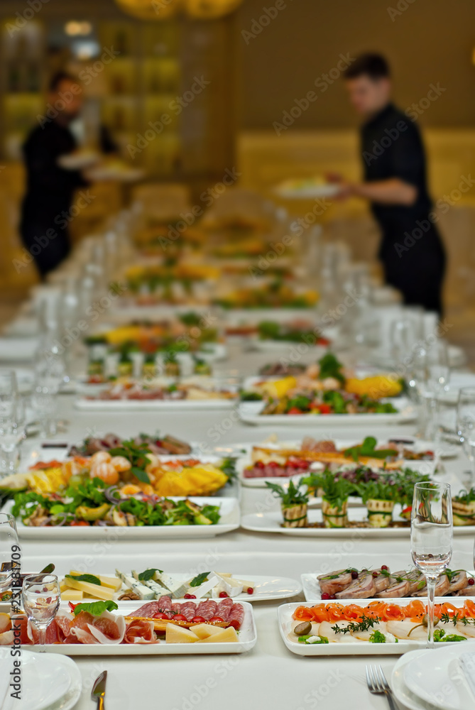 Obraz premium delicious dishes on the table in the restaurant. serving table.