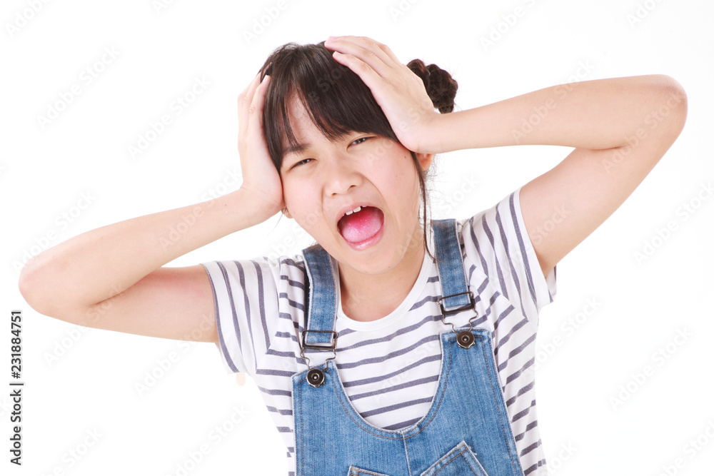 Pretty excited asian girl funny acting in studio with white background. Pretty excited asian girl funny acting in studio with white background.