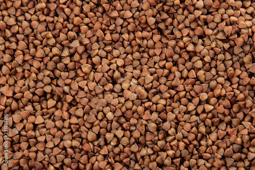 Background of buckwheat closeup. cereals. healthy food. porridge. place for inscription.