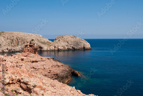 Headland of  Morell bay of Menorca island photo