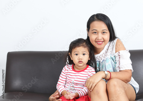 Portrait of Asian Mother and Asian kid, isolated on white background