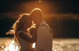 couple in love, the bride and groom at sunset