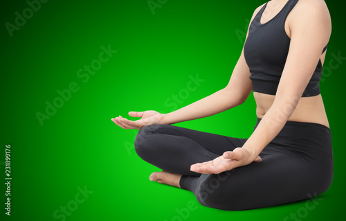 Close-up of of young woman meditating in yoga poses