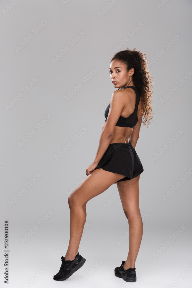 Full length sie view portrait of a confident afro american Full length sie view portrait of a confident afro american