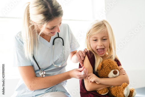 A cute Child Patient Visiting Doctor's Office
