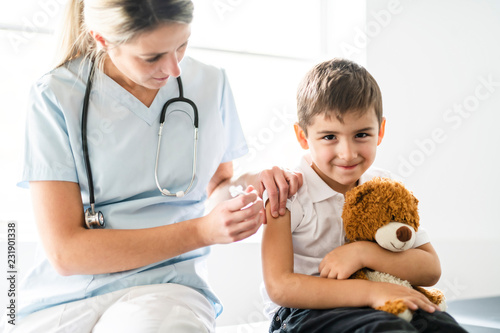 A cute Child Patient Visiting Doctor's Office