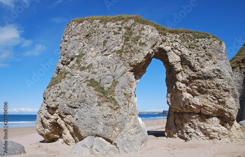 Gate in rock on White Rocks Beach in Northern Island