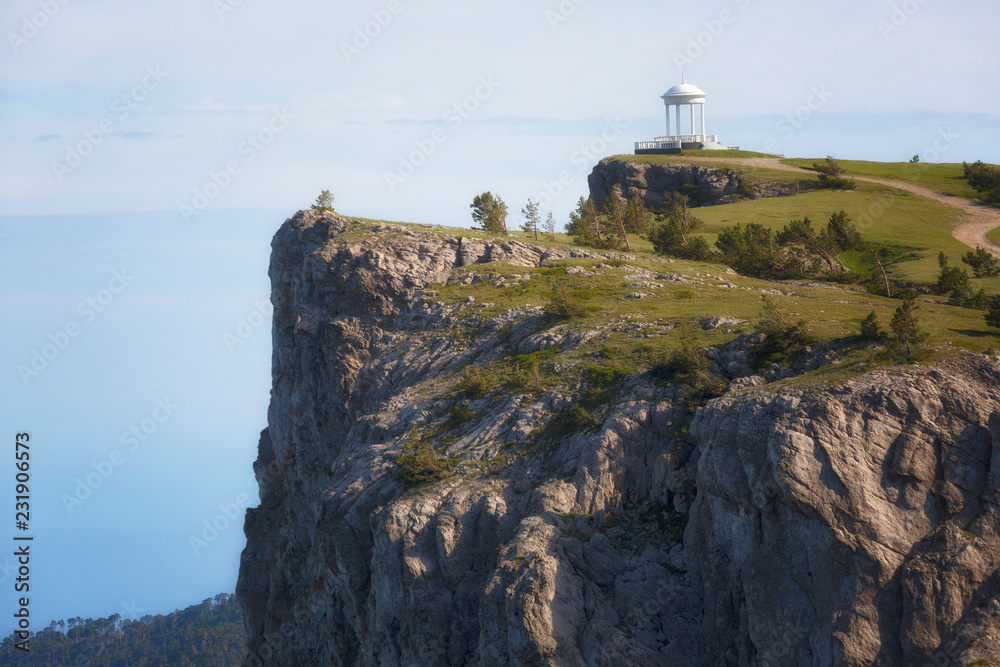 Crimea, Windy Arbour on a rock on a sunny summer day