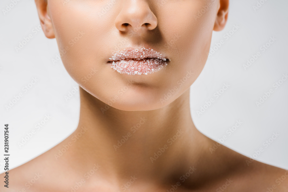 close up of young woman with sugar on lips close up of young woman with sugar on lips