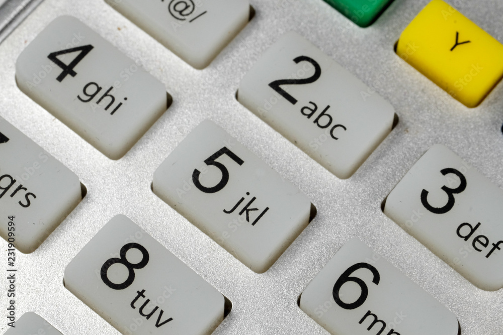 Macro photography of number button on remote controller. Macro photography of number button on remote controller.