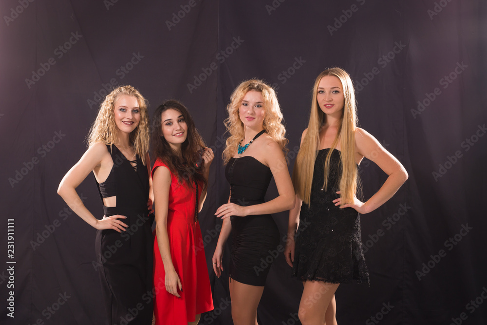 Party time of four beautiful young women having fun celebrating new year or birthday. Party time of four beautiful young women having fun celebrating new year or birthday.