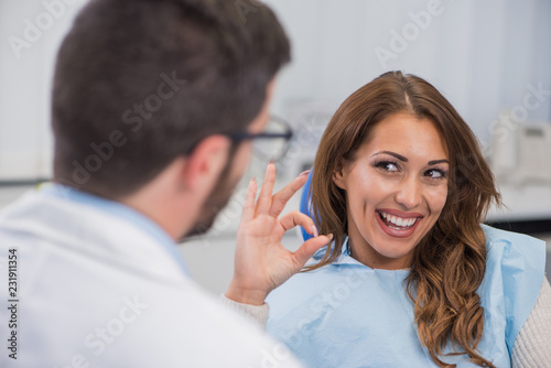 Wallpaper Mural Satisfited patient with her dentist Torontodigital.ca