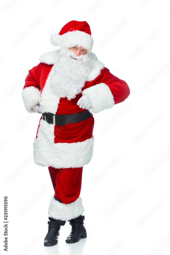 happy santa claus posing at christmastime isolated on white happy santa claus posing at christmastime isolated on white