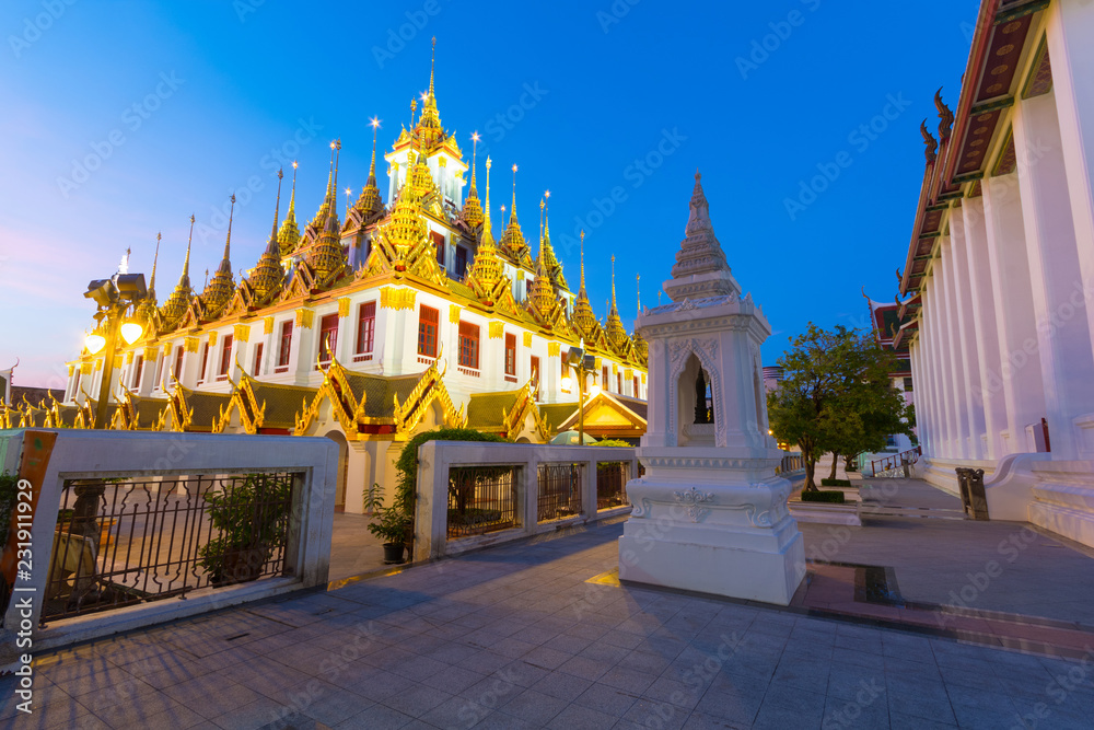 Loha Prasat in Wat Ratchanatdaram at dusk in Bangkok, Thailand.